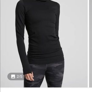 NWOT-Never worn, never washed. Athleta black ribbed mock turtleneck, size small.